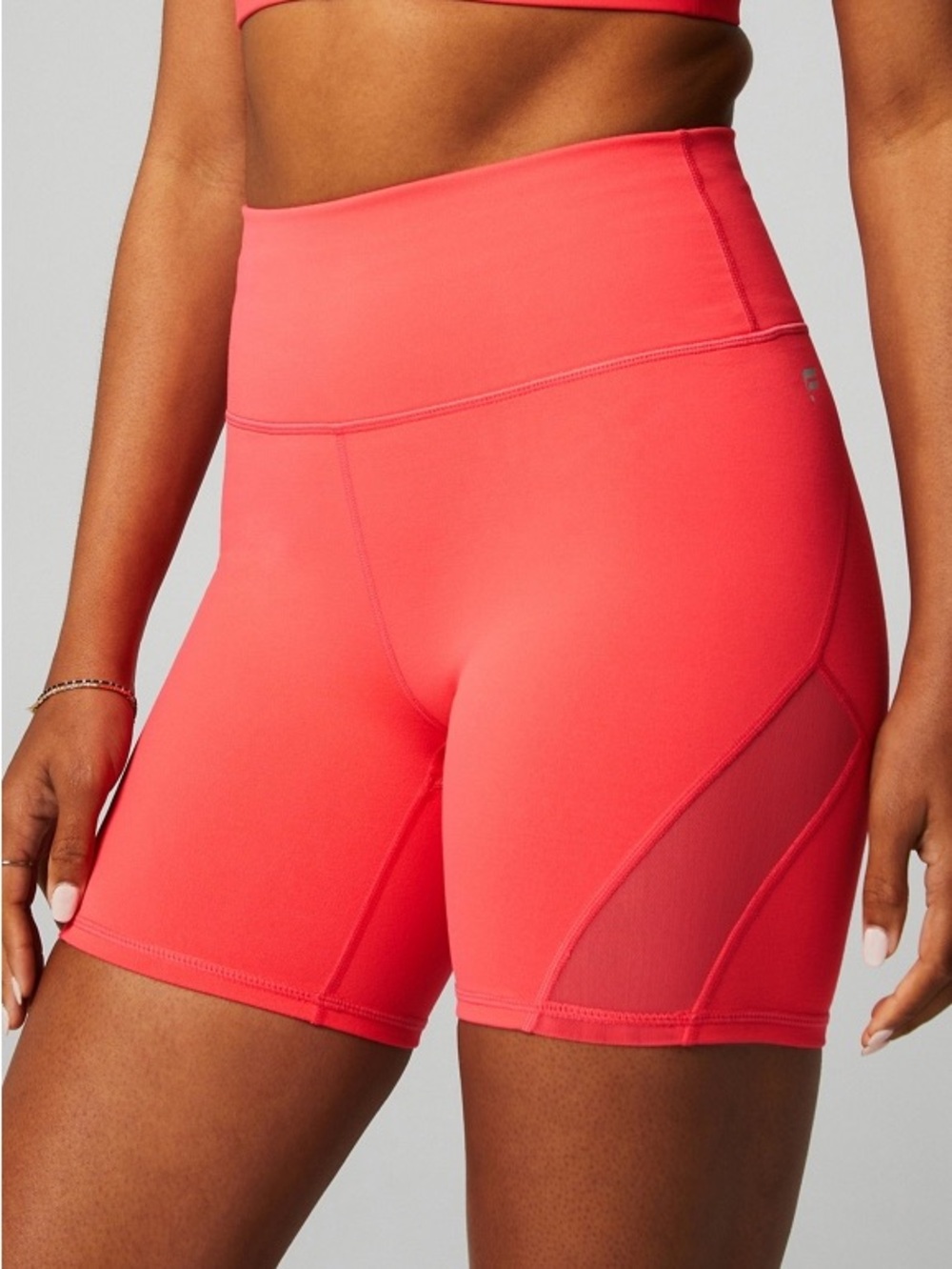 High-Rise Coral Bike Shorts with Mesh Panels